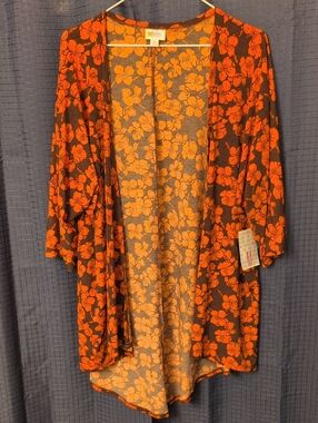 NWT LuLaRoe Orange Floral Open-Front Kimono Jacket on Brown Background